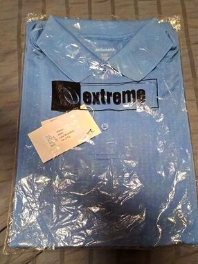 Extreme Performance Polo — Light Blue